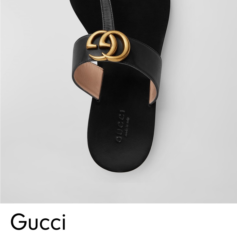 Gucci Black Slide Sandals with Gold Emblem